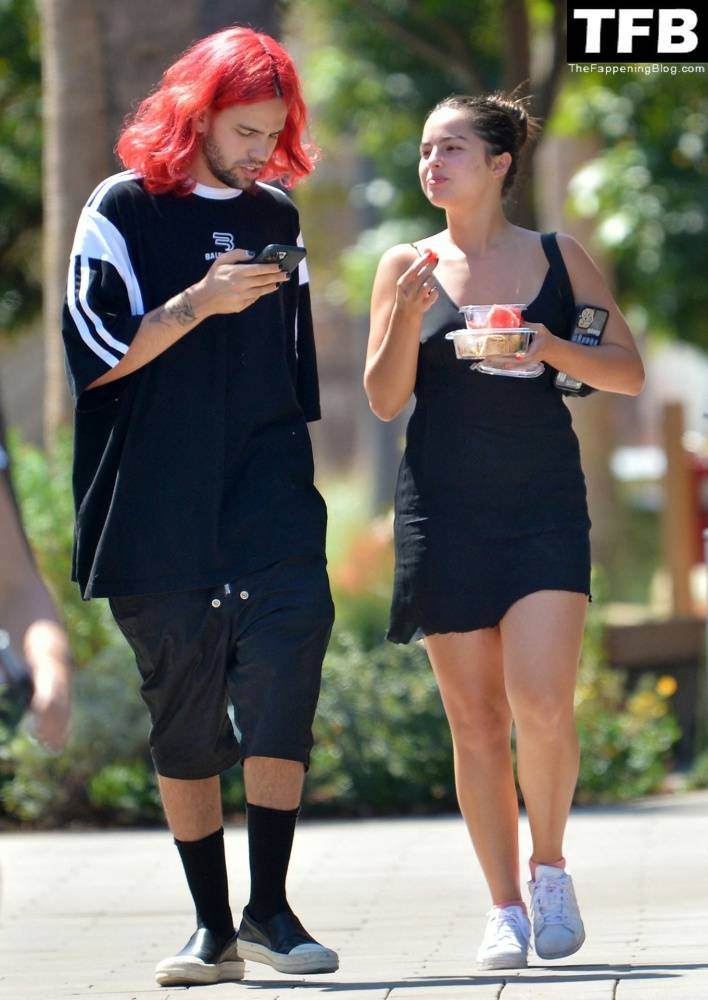Addison Rae Indulges in Some Refreshing Watermelon While Out in a Tight Skirt with Her Boyfriend - #1