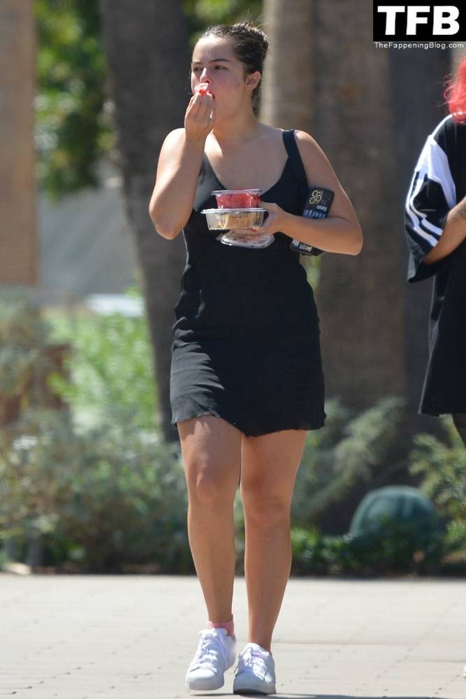 Addison Rae Indulges in Some Refreshing Watermelon While Out in a Tight Skirt with Her Boyfriend - #19