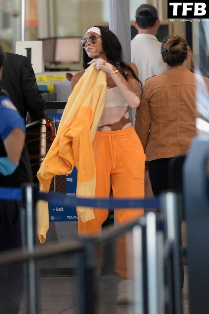 Winnie Harlow Flashes a Wave and a Smile as She Jets Out of LAX Airport - #13