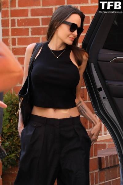 Angelina Jolie Shows Off Her Tight Tummy Leaving an Office Building