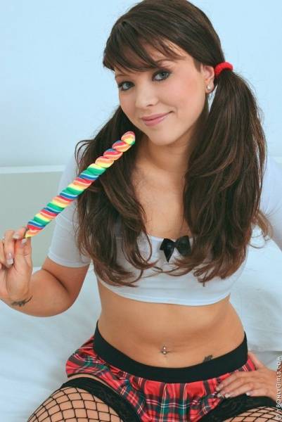 Naughty Babe Natalia Forrest Poses In Her Stockings And Sucks On A Lollipop To Make Us Sweat on dailyfans.net